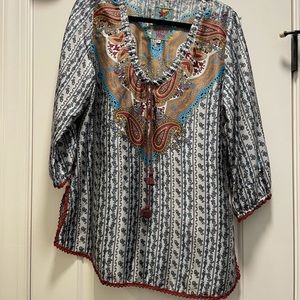 Beautiful Johnny was silk tunic 3/4 length sleeve.